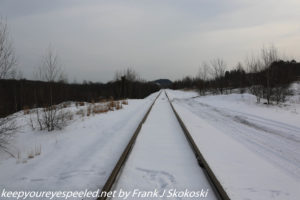 snow covered railroad tracks