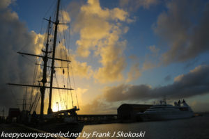 sail ship and cruise ship in morning sunlight
