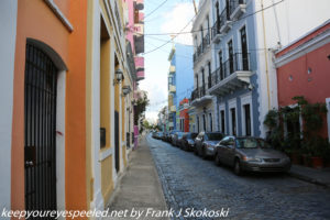 narrow blue cobblestone street