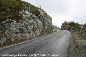 road along rocky cliff 