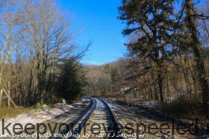 wintry scene on railroad tracks 